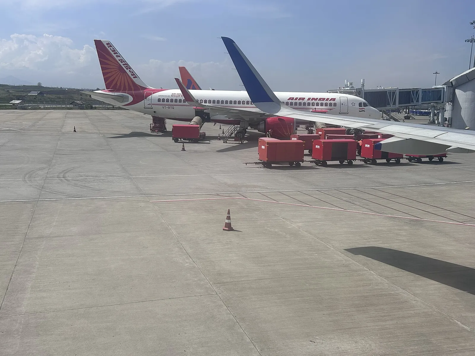 Terminal side of Srinagar International Airport in Budgam with Air India aircraft on the apron