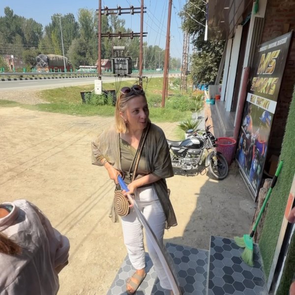 Our guests try a Kashmir willow cricket bat